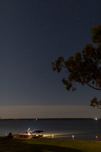 Lake fishing at night in summer - Australian Stock Image