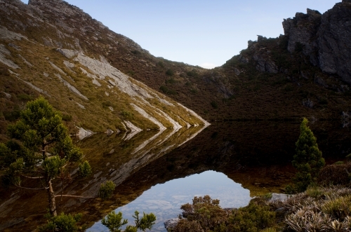 Lake surrounded by cliffs - Australian Stock Image