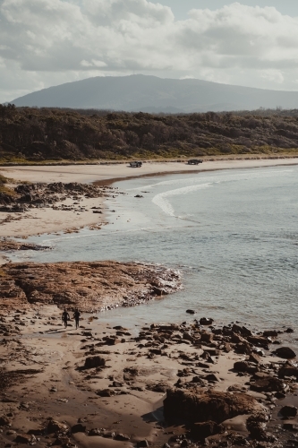 Landscape of the rocky coast and clear water at Diamond Head Beach, NSW. - Australian Stock Image