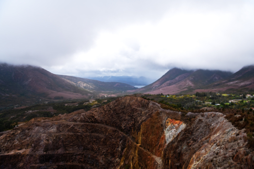 Landscape view of an old open cut mine on a cloudy day, Tasmania - Australian Stock Image