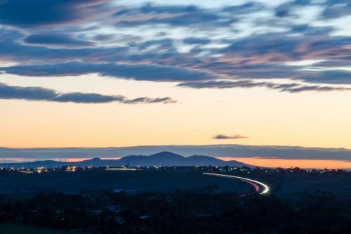 Landscape view of the You Yangs with light trails