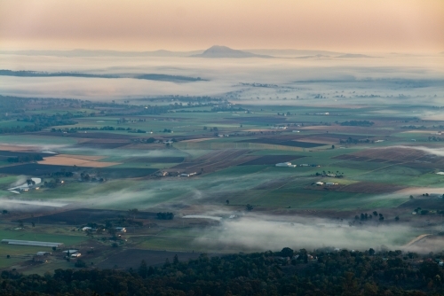 Landscape with early morning  fog and low clouds in the Scenic Rim - Australian Stock Image