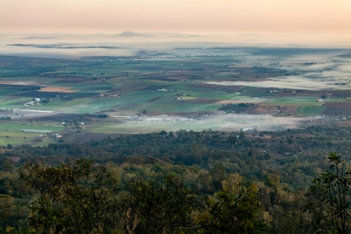 Landscape with early morning  fog and low clouds in the Scenic Rim - Australian Stock Image