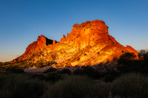 Landscape with Red rocky outcrop at Sunset - Australian Stock Image