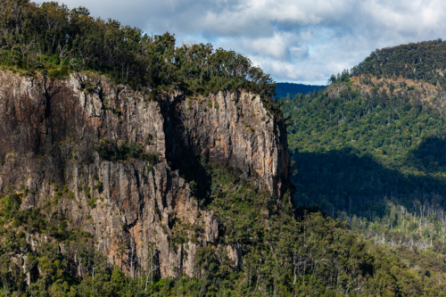 Landscape with rocky cliff and plateau - Australian Stock Image