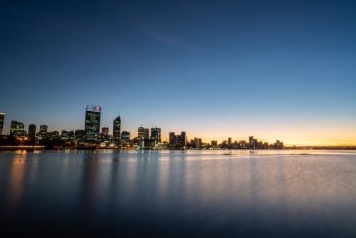 Last light over Swan River and Perth city skyline - Australian Stock Image