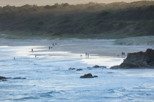 Late afternoon summer beach walking - Australian Stock Image