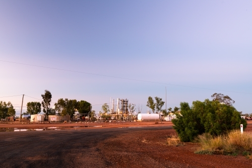 Late afternoon view of industrial area in remote outback - Australian Stock Image