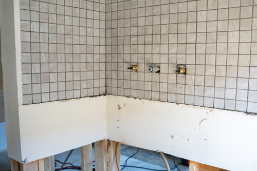 Laundry renovation - Tiled Splashback without taps - Australian Stock Image