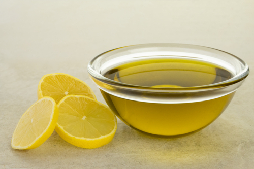 Lemon-infused olive oil - Australian Stock Image