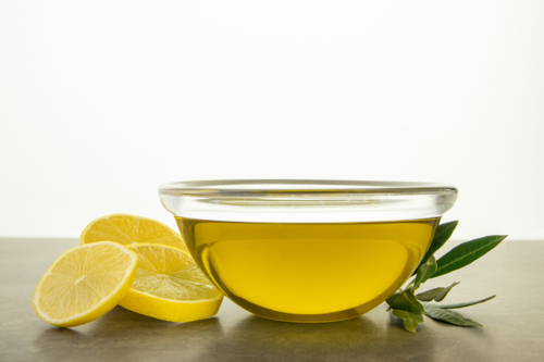 Lemon-infused olive oil - Australian Stock Image