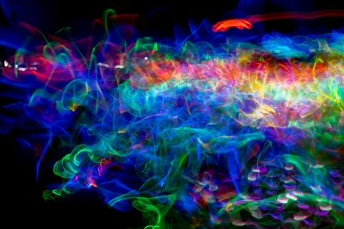 Light motion blur with glow sticks - Australian Stock Image