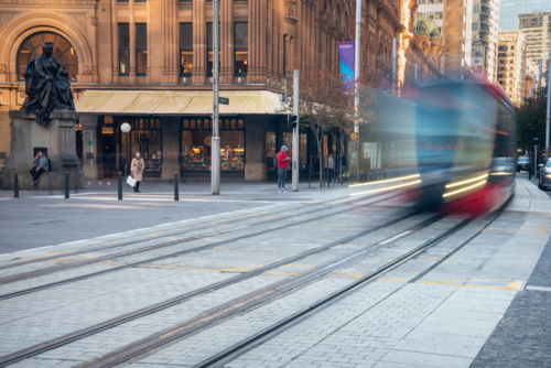 Light rail train in front of the historic Queen Victoria Building - Australian Stock Image