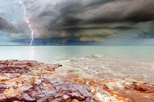 Lightning over Darwin city across the water