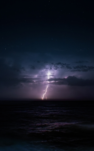 Lightning Storm out at Sea at Nighttime