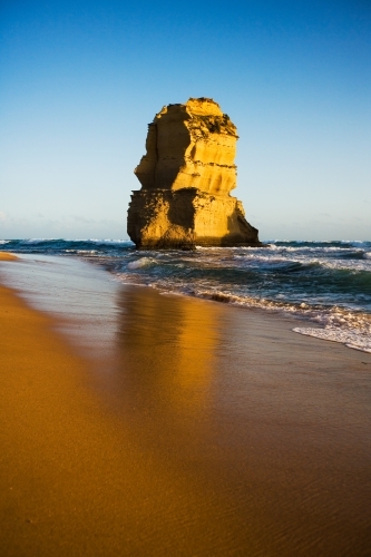 limestone stack reflected in the water - Australian Stock Image