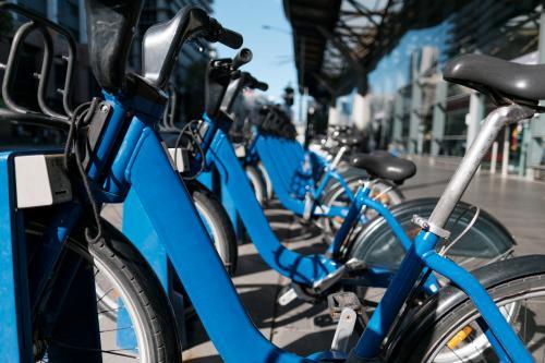 Line of Blue Bicycles outside Southern Cross Station - Australian Stock Image