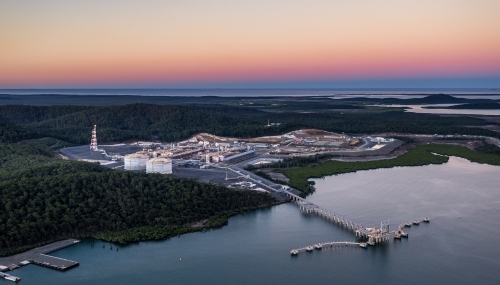 Liquified natural gas plant (LNG) on Curtis Island with the coral sea in the background - Australian Stock Image