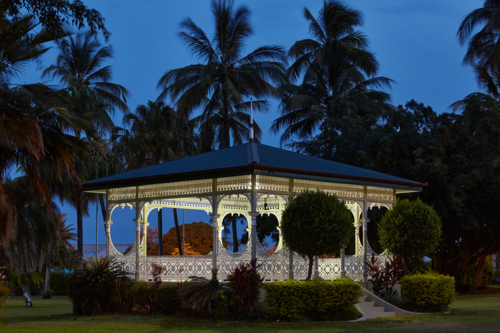 Lit heritage rotunda in park at dusk. - Australian Stock Image