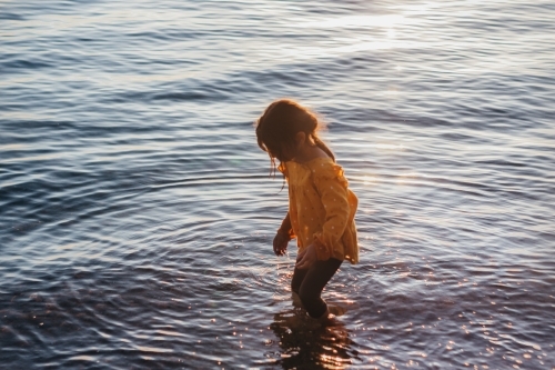 Little girl in the sea - Australian Stock Image