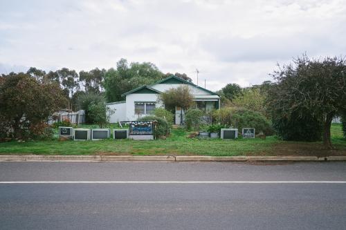 Local house in country town with a TV fence - Australian Stock Image