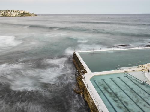 long exposure of Bondi Beach and Icebergs Pool - Australian Stock Image