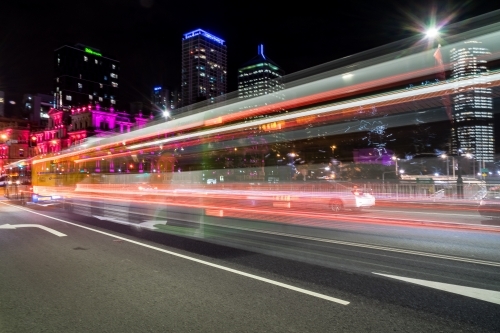 Long exposure of bus going past - Australian Stock Image