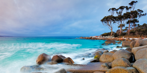 Long exposure of coastline at bay of fires tasmania - Australian Stock Image