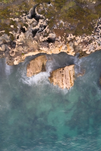 Long exposure of waves on limestone cliffs at the Henderson Cliffs
