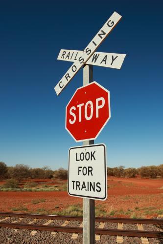 Look for trains railway crossing sign in the outback