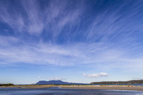 Looking across the bay to Maria island. - Australian Stock Image