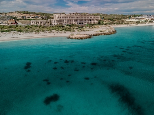 Looking across the ocean at abandoned power station - Australian Stock Image