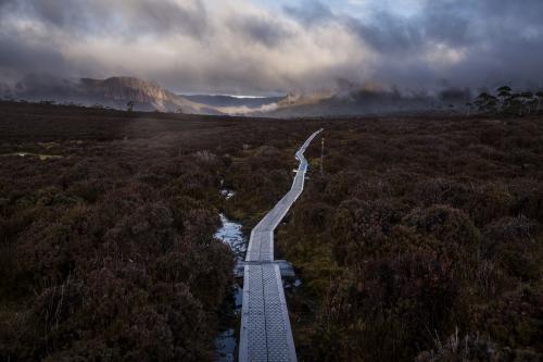 Looking ahead along trail whilst walking the Overland Track - Australian Stock Image