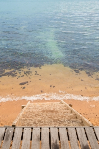 looking down into the ocean from a beach hut, Mt Martha, Victoria, Australia - Australian Stock Image