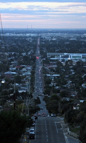 Looking down main road that leads to the port in Adelaide at dusk