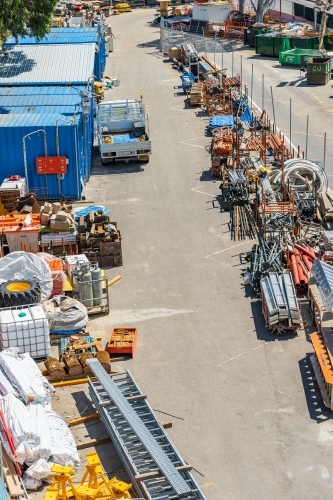 Looking down on construction yard stacked with building materials - Australian Stock Image