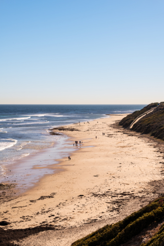 Looking down towards of people on beach, Seaford Beach, South Australia - Australian Stock Image
