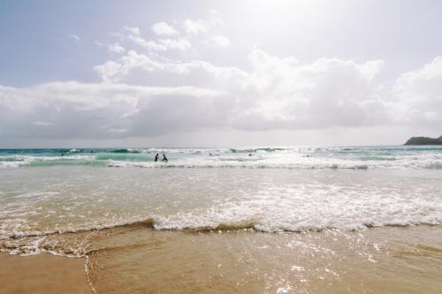 Looking into the surf and sunlight on a summers day at Bondi Beach - Australian Stock Image