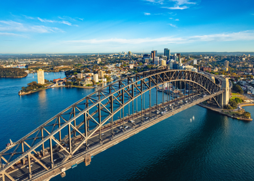 Looking north over the Sydney Harbour Bridge towards North Sydney and St Leonards - Australian Stock Image