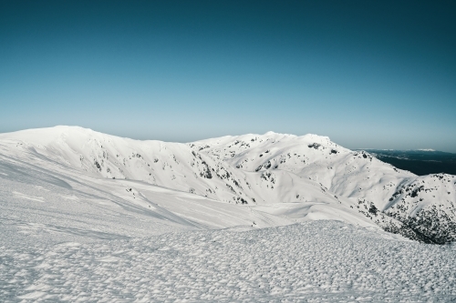 Looking over the snow covered Main Range valleys of Kosciuszko National Park - Australian Stock Image