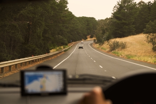 Looking through car front window on a road trip - Australian Stock Image