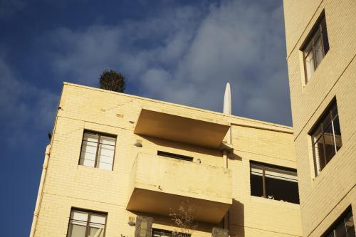 Looking up at an apartment balcony