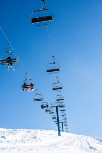 Looking up at chairlift in Mt Hotham ski resort - Australian Stock Image