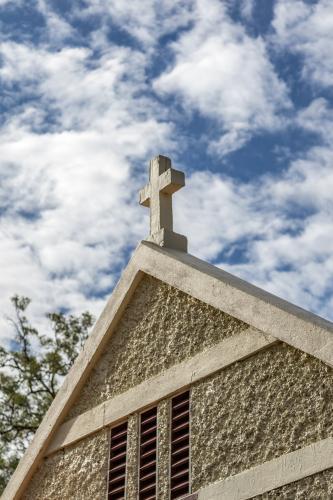 Looking up at the cross on top of Reedy Creek country church - Australian Stock Image