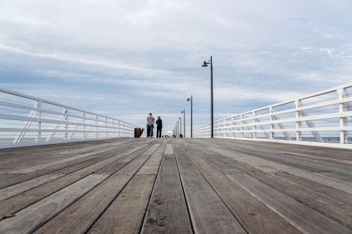 Low angle view of jetty boardwalk - Australian Stock Image