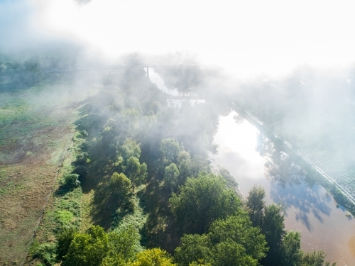 Low cloud and mist covering New England Highway bridge going over the Hunter River in Singleton - Australian Stock Image