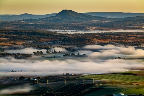 low foggy cloud over rural farming scene - Australian Stock Image