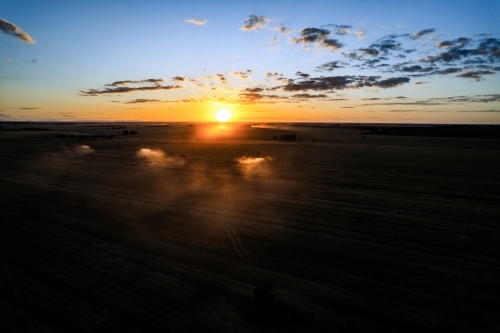 Low sunset over agricultural fields - Australian Stock Image