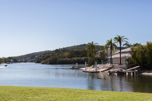 luxury waterfront home in tropical Noosa Heads, Queensland - Australian Stock Image