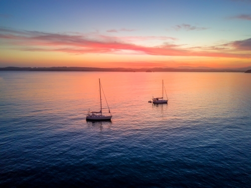 Luxury Yachts at sunset in Batemans Bay - Australian Stock Image
